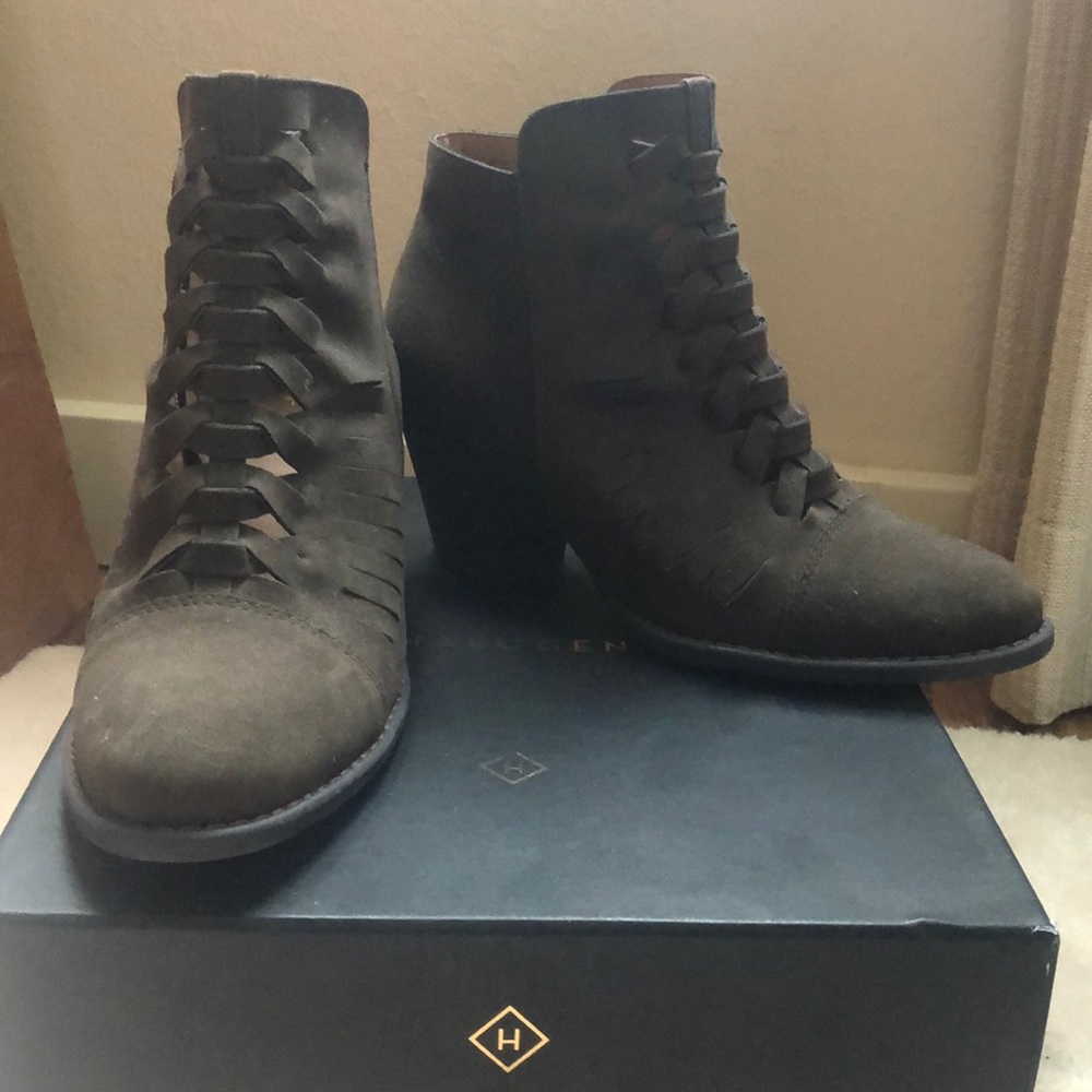 Booties with zip up in back. Never worn